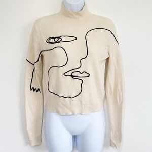 AKIRA Willa Abstract Face Ribbed Turtleneck Sweater Medium